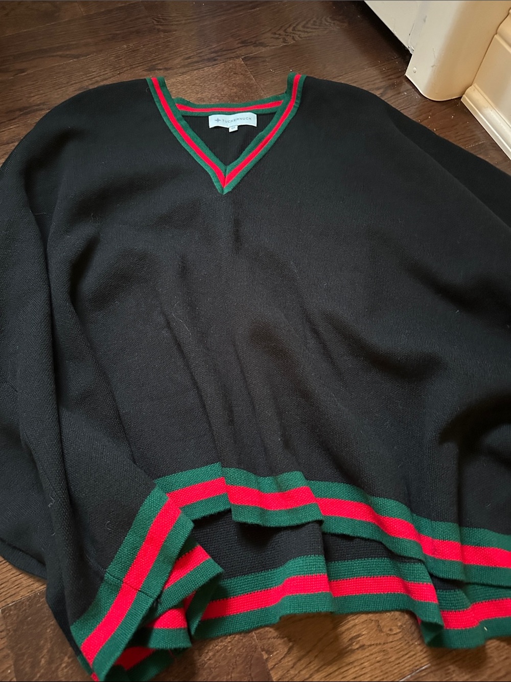 Tuckernuck Black V‑Neck Sweater with Green and Red Stripe Trim